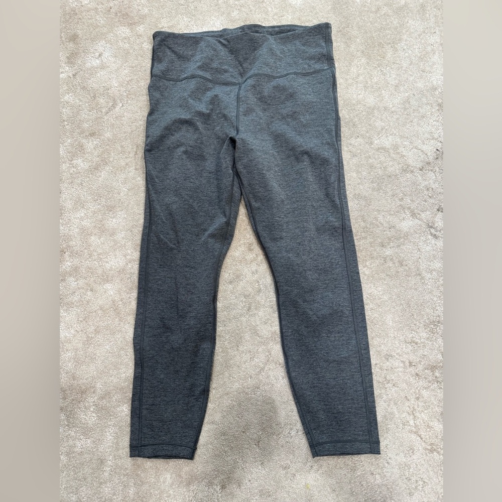 Athleta Ultimate 7/8 stash pocket legging. Size L. Heather gray